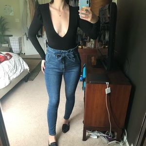 UO Deep V bodysuit with ruffled shoulder